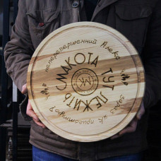 Кухонна дошка кругла з гравіруванням - смакота тут лежить